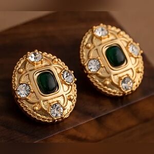 Vintage-style gold-tone stud earrings w/ green center stone and clear crystals